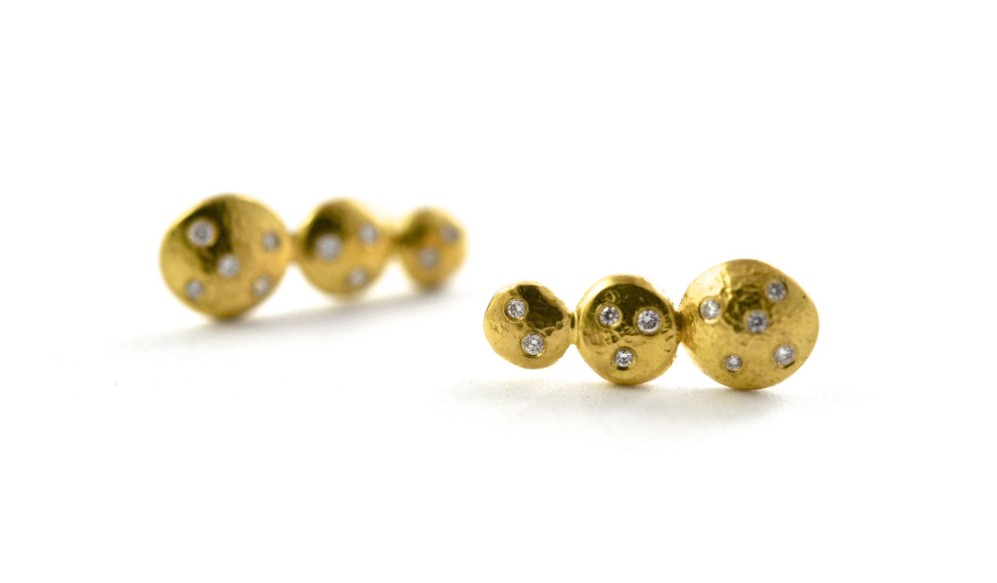 earrings / gold hammered 22k graduated discs + diamonds